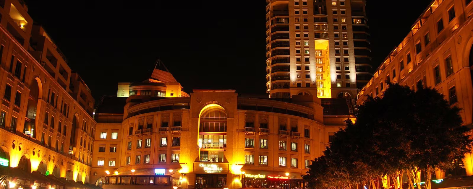 Nelson Mandela Square in Sandton, lit at night